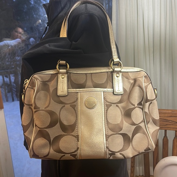 Gold coach purse